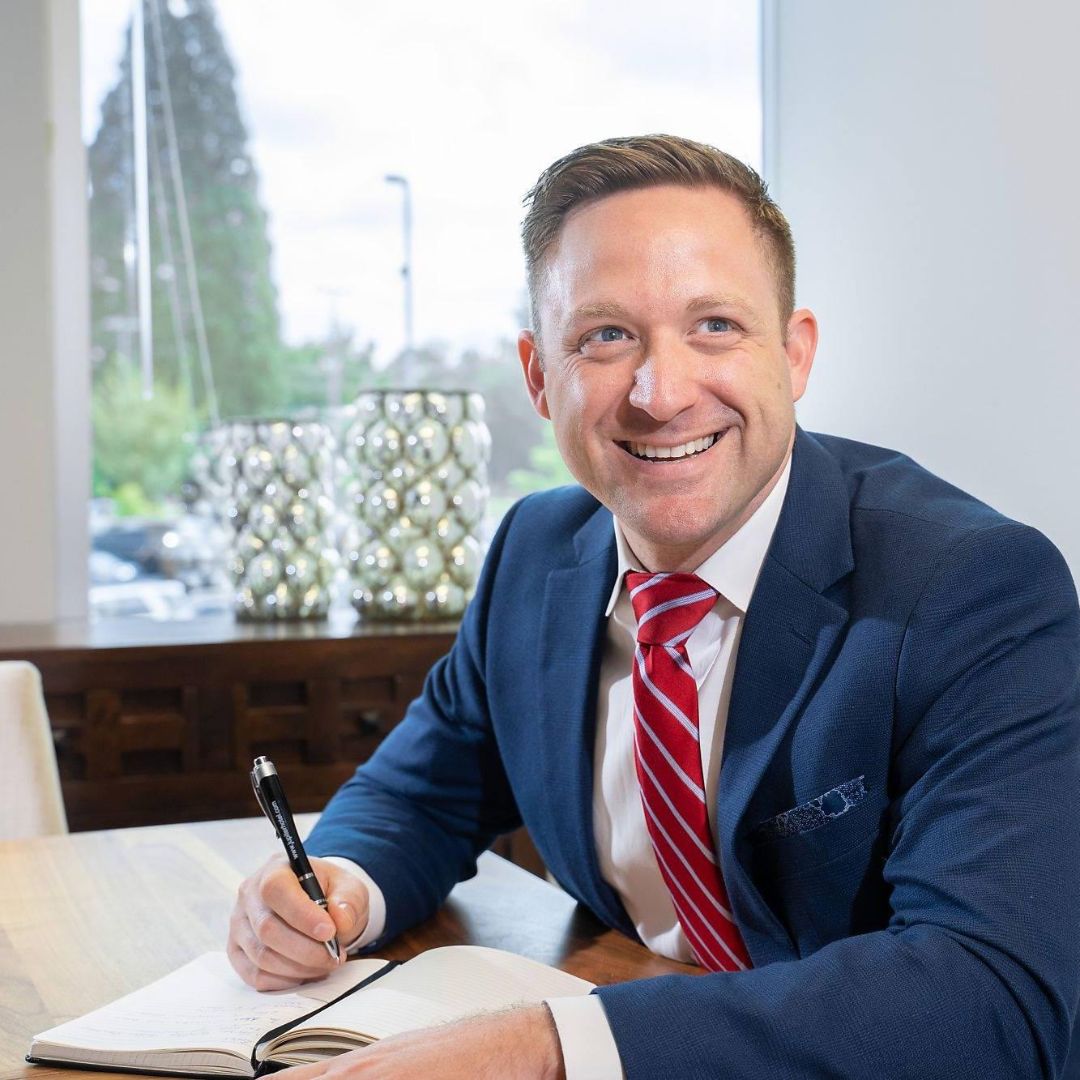 Aaron Heard, CEO of Keller Williams Portland Central, working at his desk